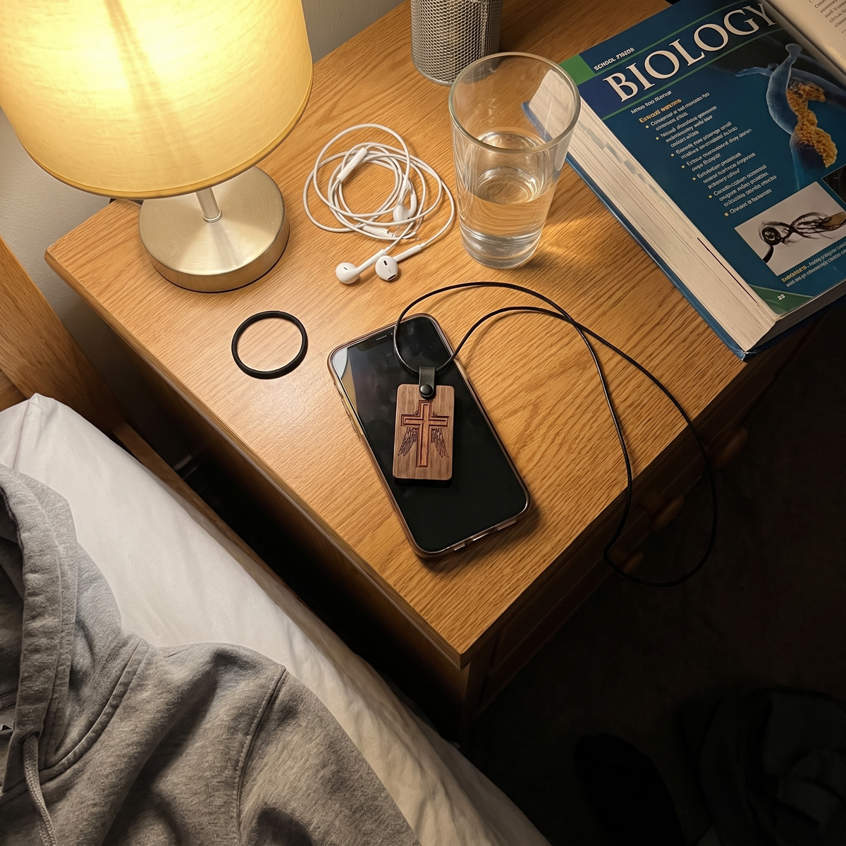 The Promise Cross on a nightstand